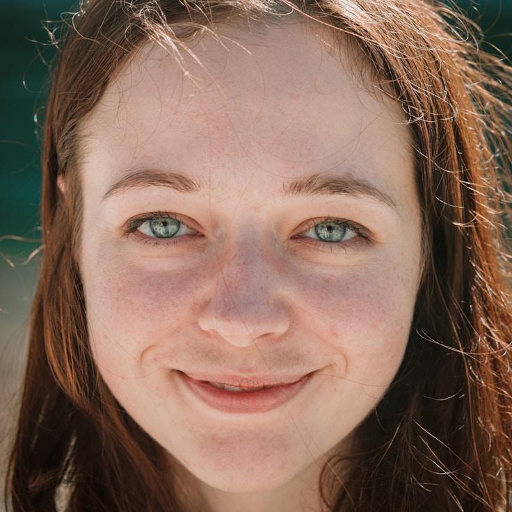 Kaveri Mehta, Lead Design Curator at PlainPavilionHub, reviewing corporate floral arrangements